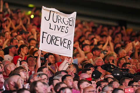 Fans greet Jurgen Klopp